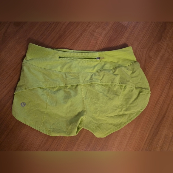 Lululemon Lime Green Run Shorts Size 4 - Picture 1 of 3